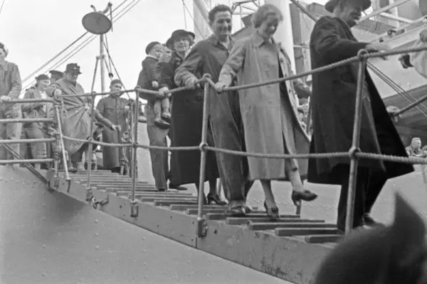 Disembarkation Day | Disembark photograph of passengers leaving ship. B&W photo.