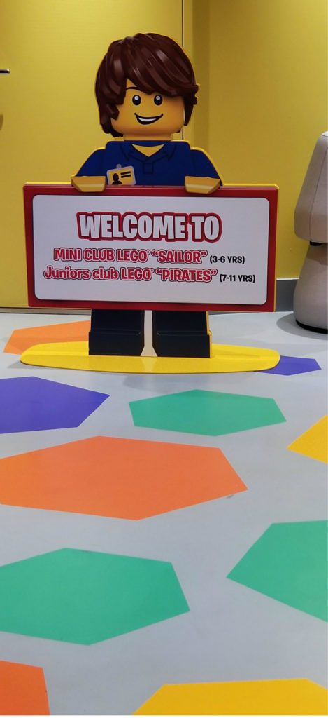 MSC Seaside Review | photo of welcome sign to kids' club on MSC Seaside cruise featuring Lego character