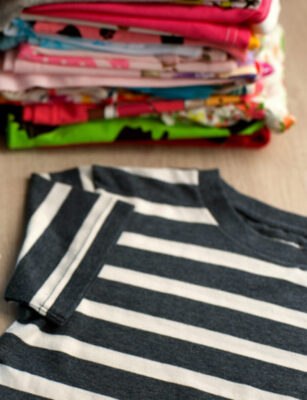 Laundry on a cruise ship - photo of small stack of fresh kids' laundry