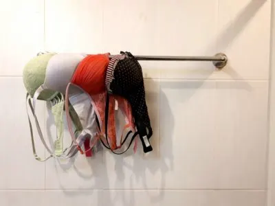 Laundry on a cruise ship - photo of bras hanging on towel rack