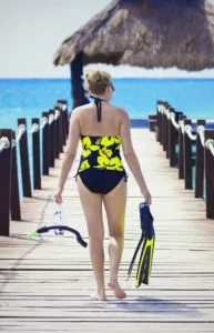 Cozumel Port | Photo of women walking with snorkel gear