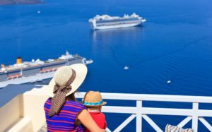 cruise shore excursions | photo of mother and child looking at cruise ships in harbor