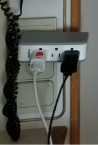 Must Have Cruise Accessory | Photo of power strip in use in cruise cabin