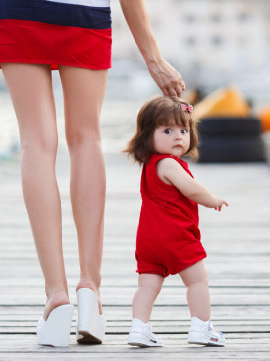 cruising with baby | photo of mom and baby walking on pier