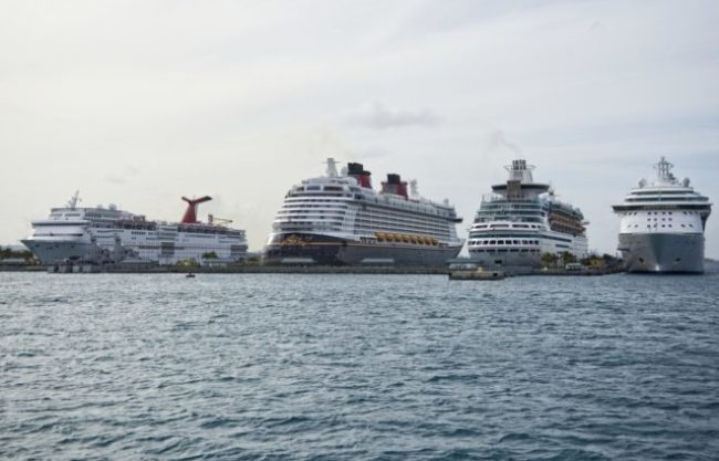 First Time Cruise Tips | photo of 4 cruise ships lined up in port