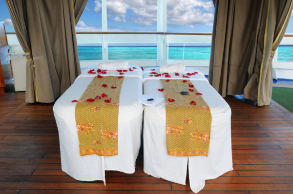 photo of side-by-side massage tables in cruise ship spa