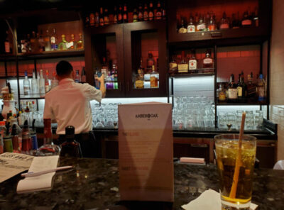 Royal Caribbean Beverage Package | photo of rear view crew member tending bar