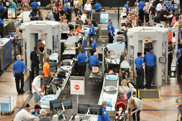 Flying with Kids | photo of crowded airport security lines