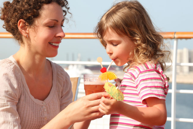 Royal Caribbean Drink Package | photo of mom sharing beverage with little girl