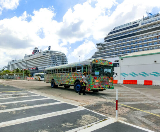 Aruba Cruise Port | Colorful tour bus in Aruba. 