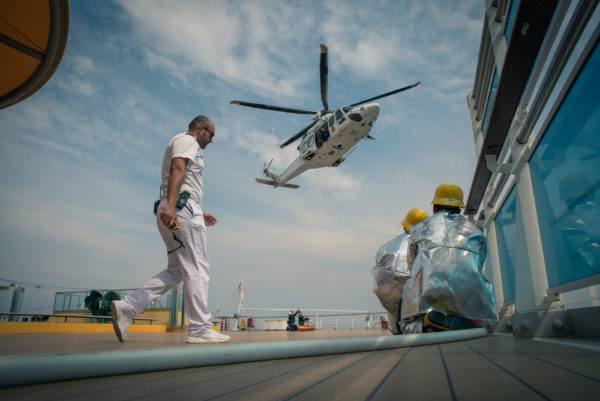 Tell Me Something That Would Ruin A Cruise | photo of emergency helicopter landing on cruise ship