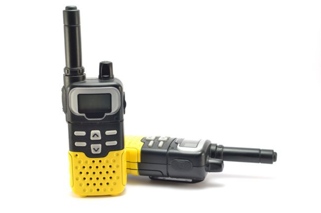 Do Walkie Talkies Work On Cruise Ships | Two way radios on a white background  