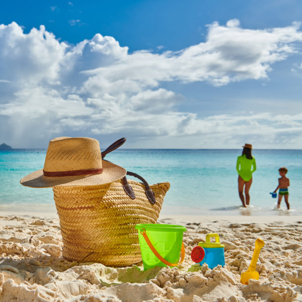 Best family beach bag | photo of family with bag and toys on beach