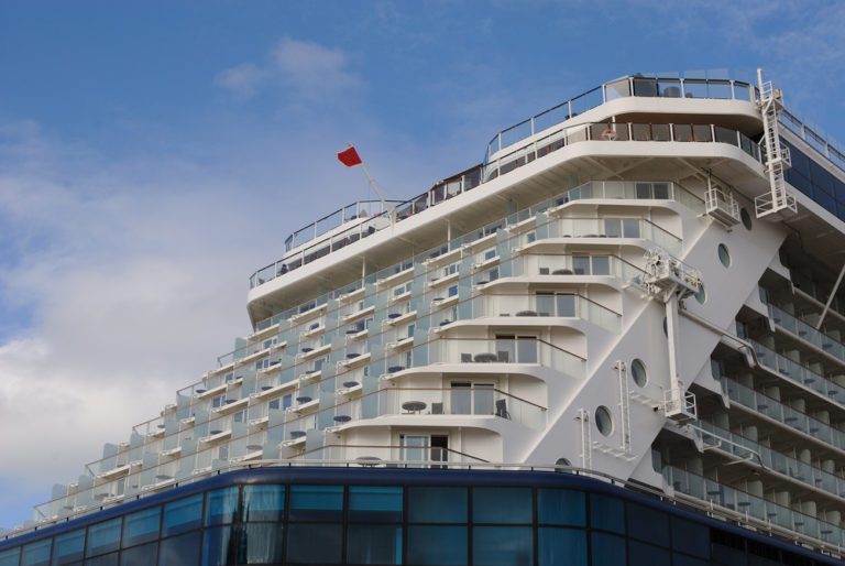 What is an aft facing balcony | photo of Aft of a cruise ship with balconies of staterooms.