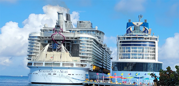 Photo of Symphony of the Seas next to Anthem of the Seas.