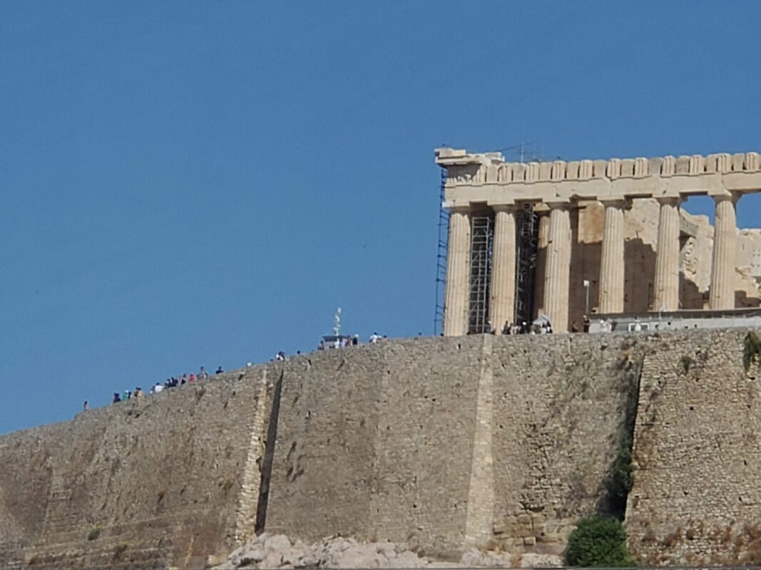 Ancient Parthenon columns atop the Acropolis with scaffolding visible, one of the most visited Mediterranean shore excursions.