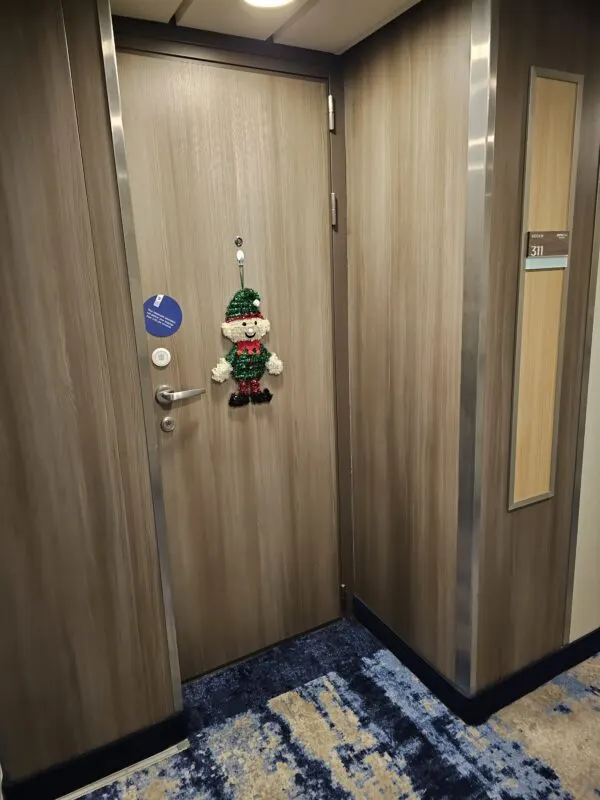 Cruise cabin door decorated with 3-D elf.