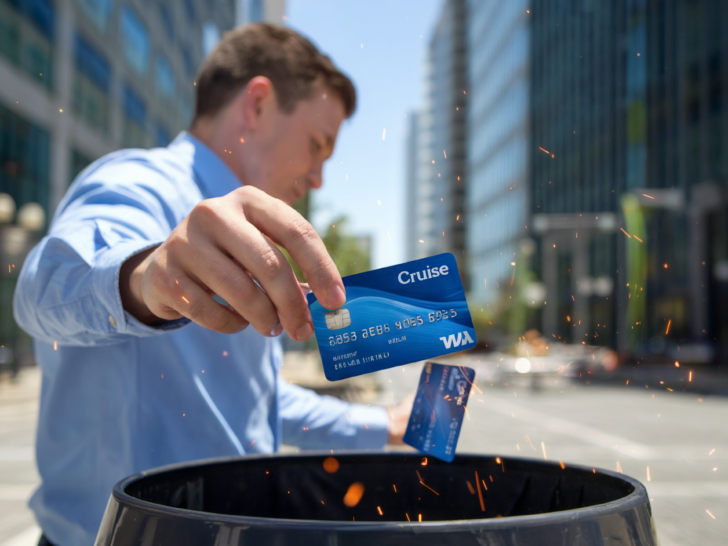 Man disposing of blue cruise line credit cards in a trash can, with sparks adding a dramatic effect.