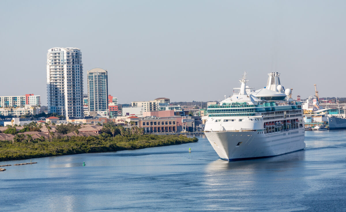 View of a cruise ship sailing through the Port of Tampa near the city’s Channelside District.